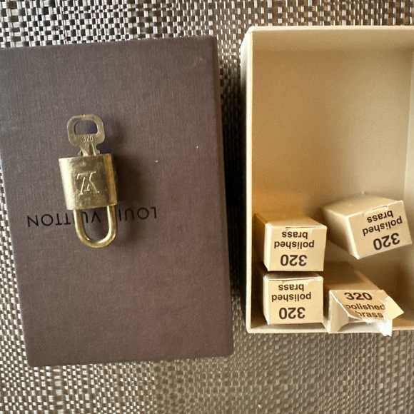 Authentic Louis Vuitton Shiny Gold Lock and Key 320 - Picture 4 of 4